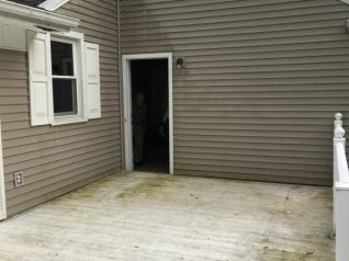 Power wash house before picture