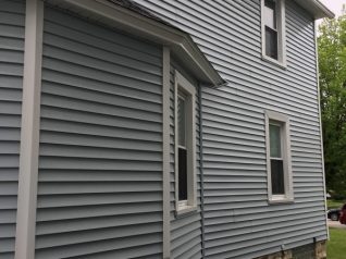 Power wash siding after Webster, ny