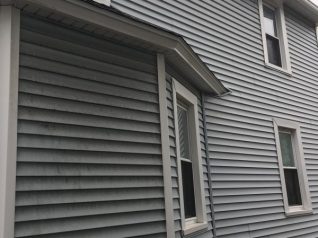 Power wash siding Webster, NY Before